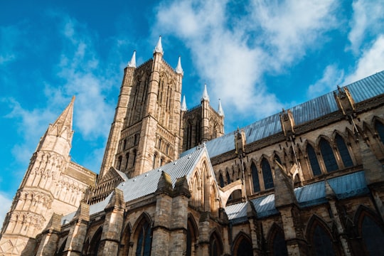 architectural photography of brown monument in Lincoln Cathedral United Kingdom