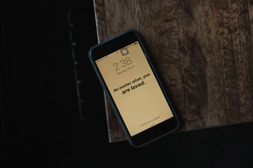 A soldier receiving supportive messages on their phone.