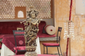 An elegant custom statue displayed in a bright, stylish living room.