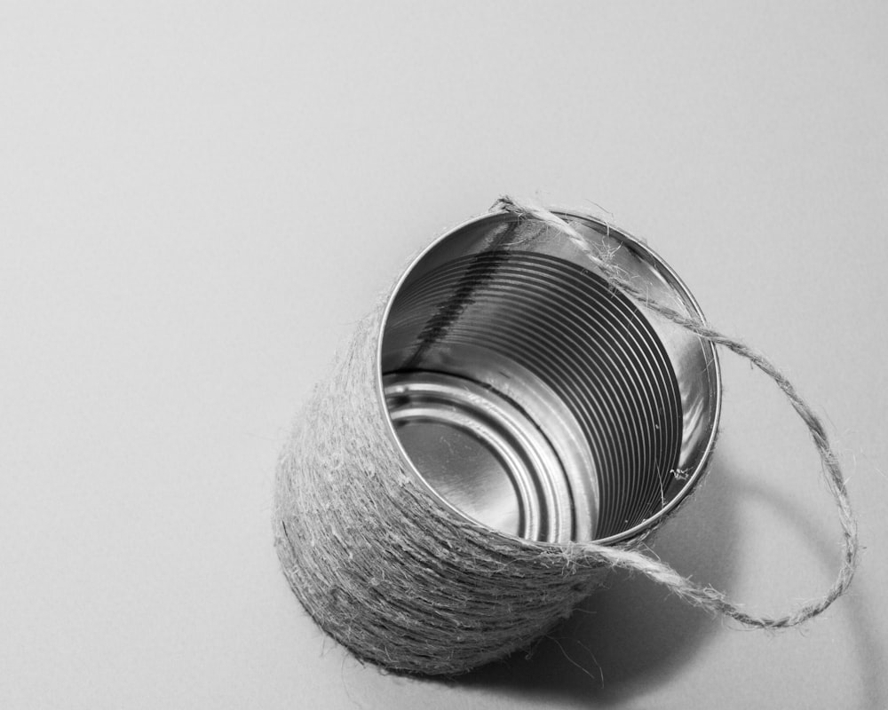 gray tin can wrapped with rope