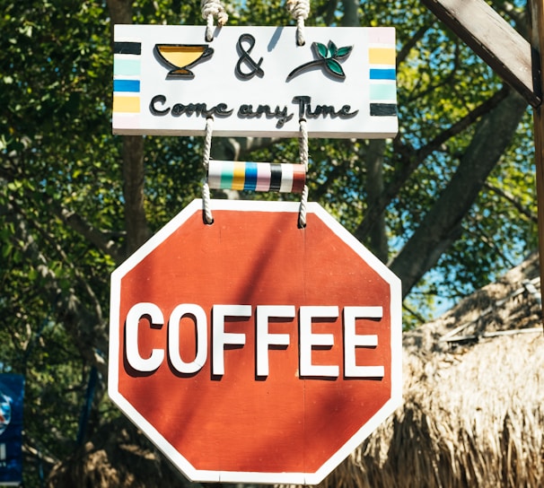 red and white coffee signage