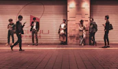 Young people connecting anonymously through their devices during late night hours.