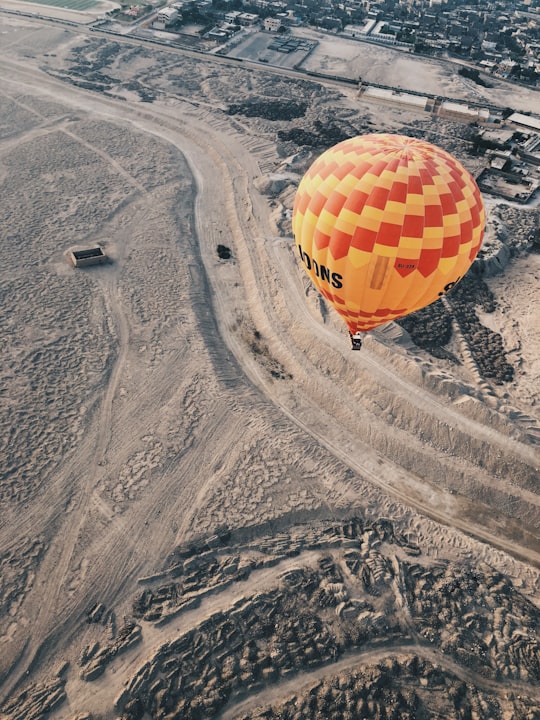 aerial photography of hot air balloon floating on air in Luxor Egypt