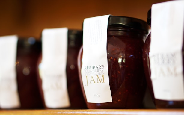 selective focus photography of Rhubarb Jam jars