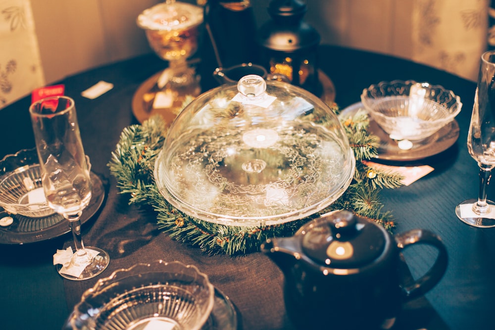 clear glass bowls on table