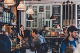 group of people eating on restaurant