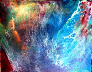 Poetic image blending microscopic textures and cosmic patterns with bold color contrasts.