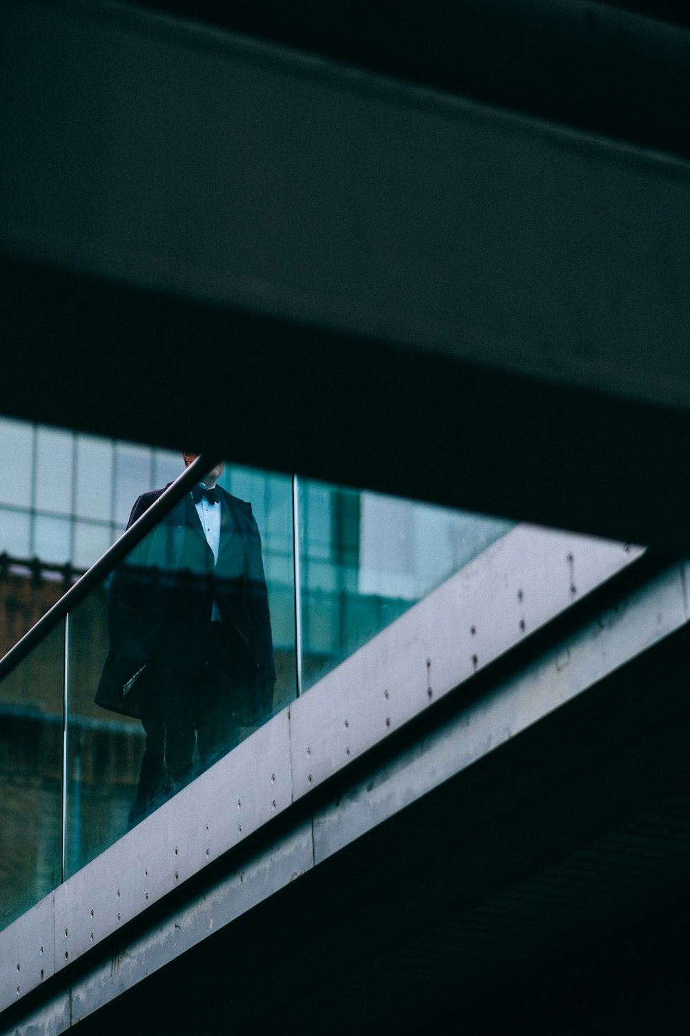 man walking on balcony