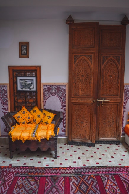 A cozy residential living room featuring custom door designs by Kumar Traders