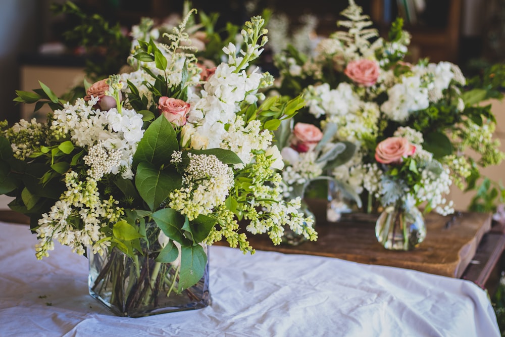 selective focus photography of pink rose flower arrangement