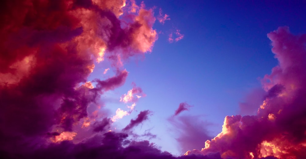 low angle view of red clouds at daytime