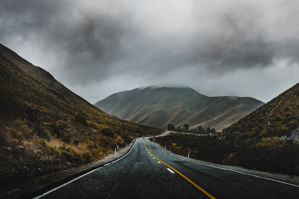 landscape photography of freeway near mountain range