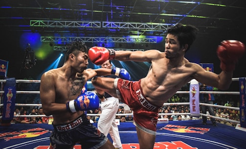 Muay Thai boxer kick opponent