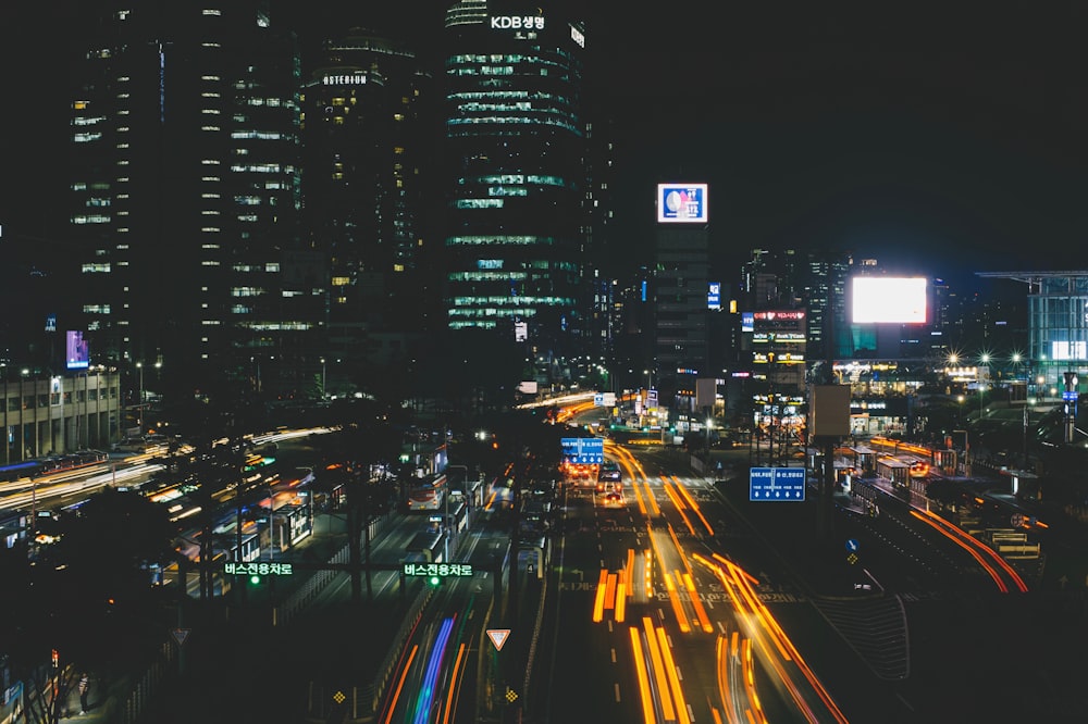 cars driving on road during nighttime in time lapse photography