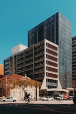 man ridding a bicycle on cossing