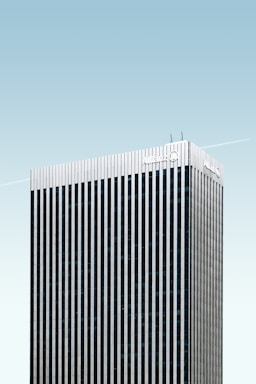 gray curtain window building at daytime