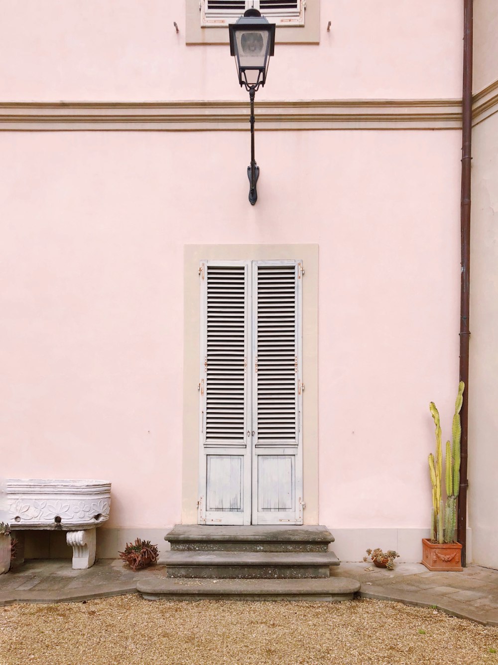 white wooden louver door