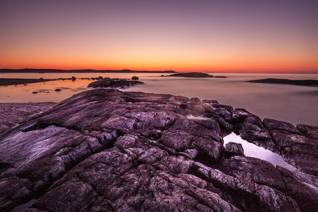 gray rock formation above sky