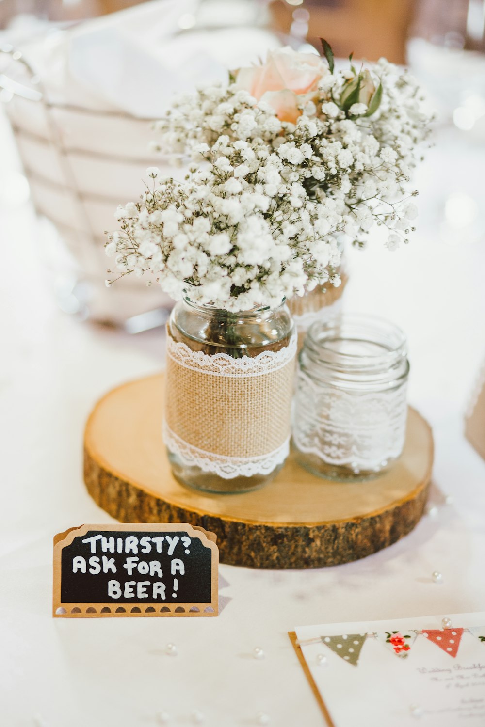 two clear glass vases with text overlay