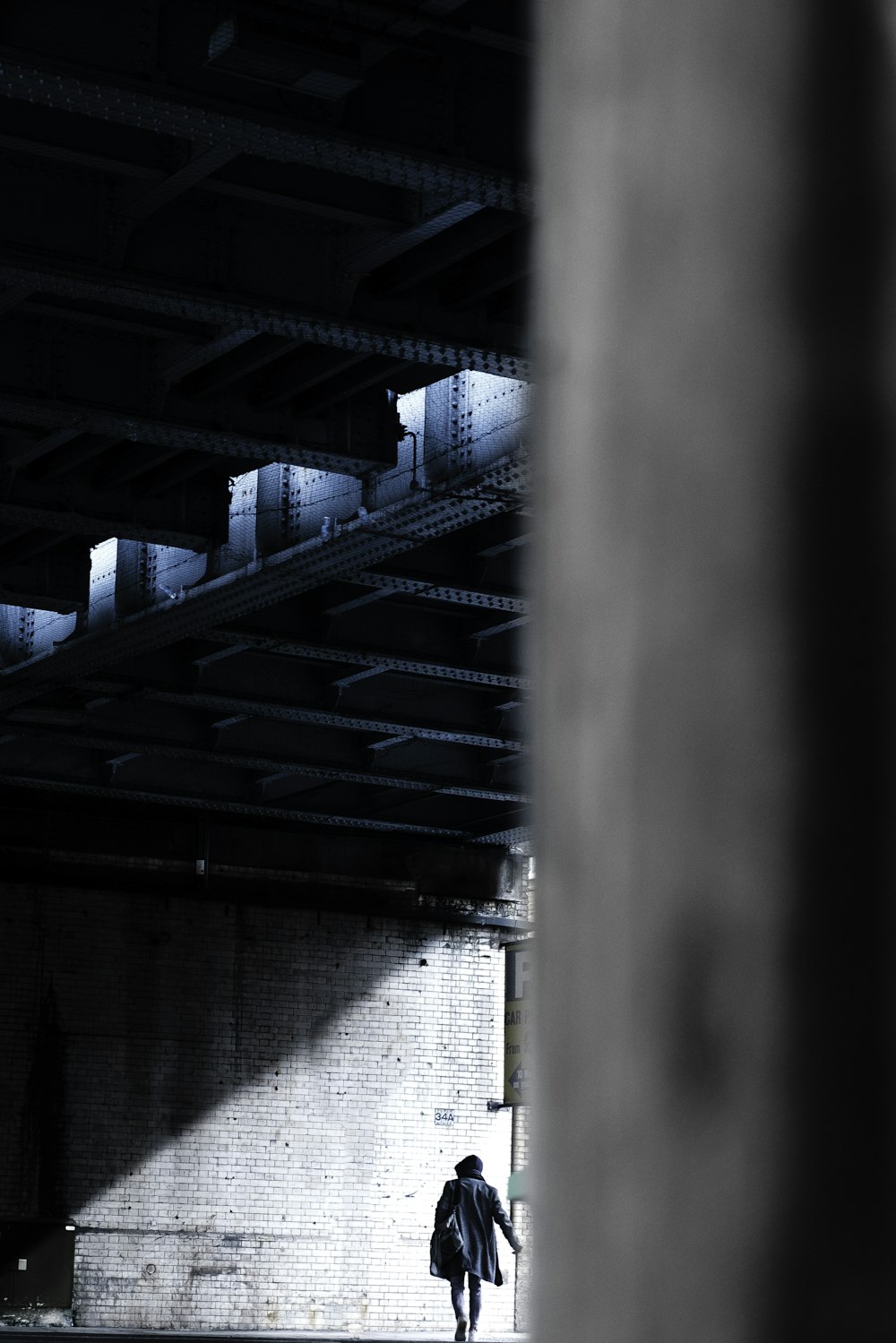 person walking towards street