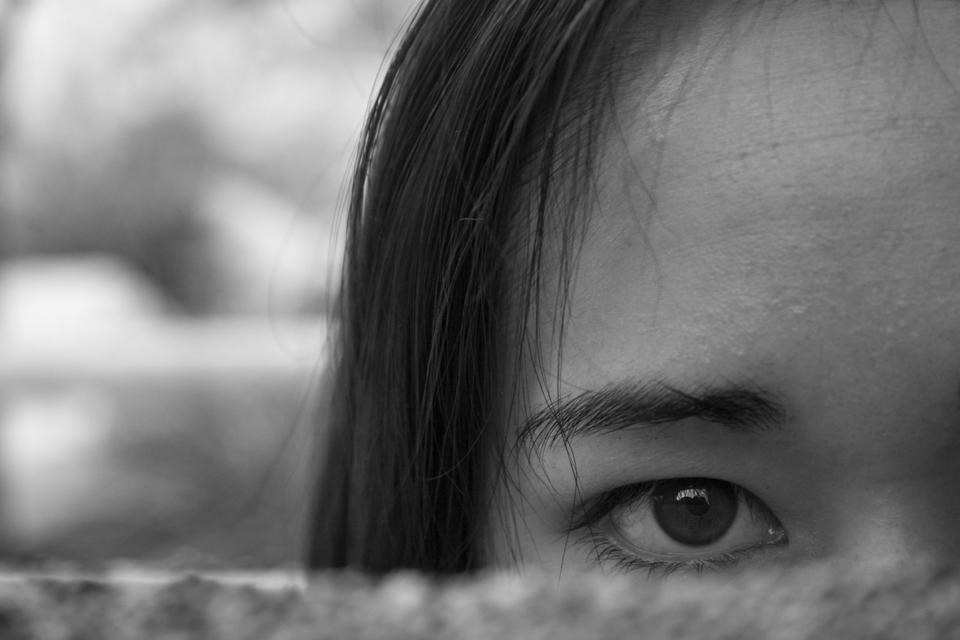 A close-up image emphasizing tactile elements, captured by a visually impaired photographer, with rich blue and black contrasts.