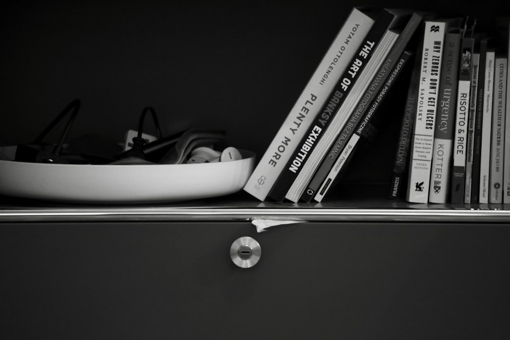 grayscale photo of books