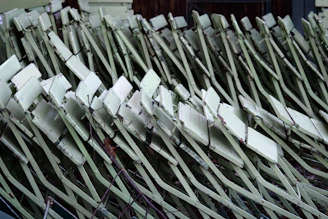 Stacked old metal furniture pieces waiting for same-day pickup service.