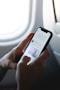 person holding space gray iPhone X