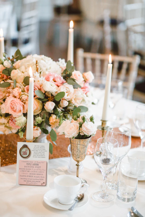 Champagne glasses and floral centerpiece