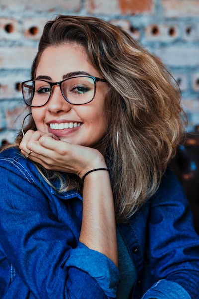 closeup photo of woman wearing black framed eyeglasses