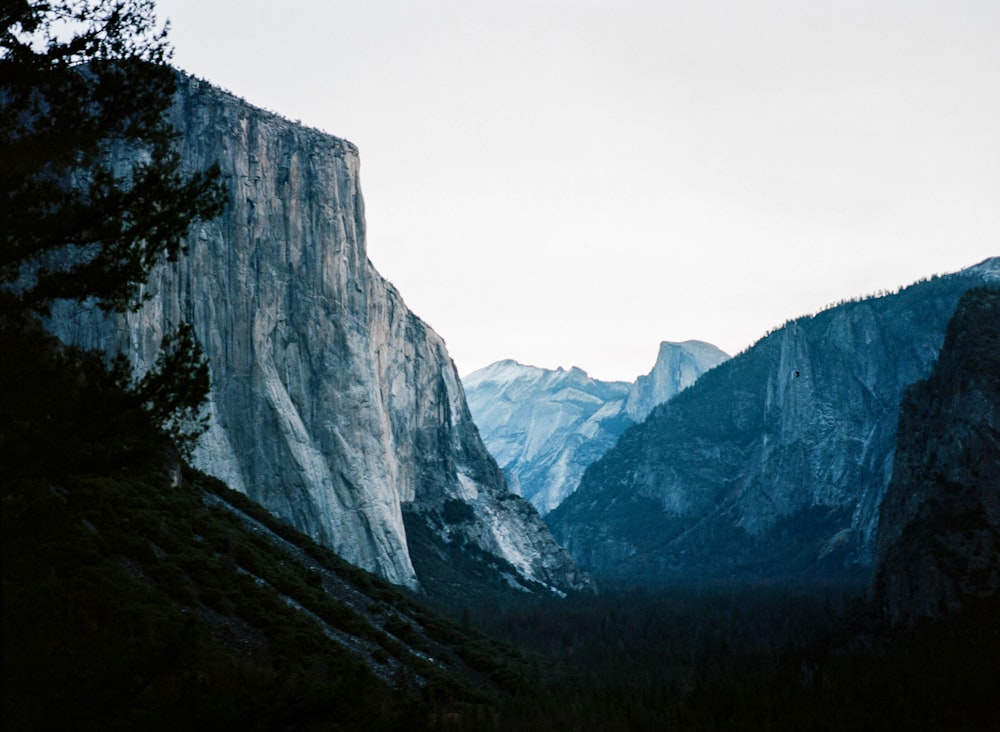 gray mountain under gray sky