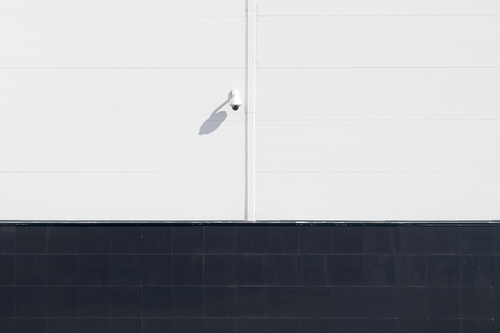 a person walking down a street with a skateboard