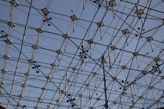A completed metal structure against a clear sky.