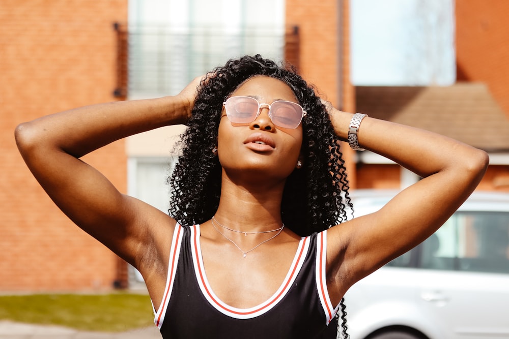 woman touching her hair