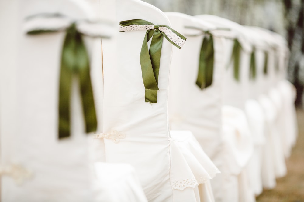 selective focus photography of white and green chair