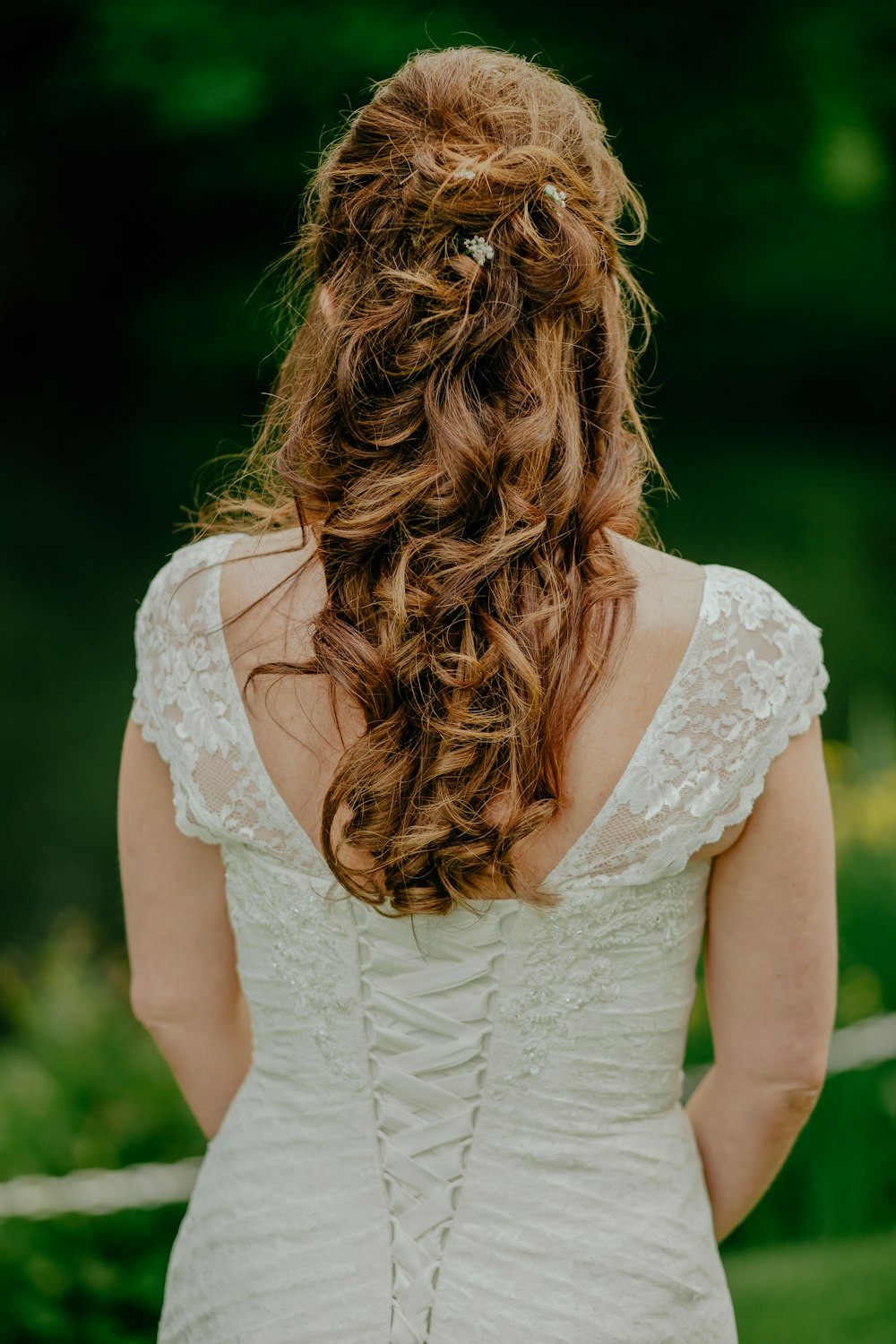 woman wearing white lace sleeveless top