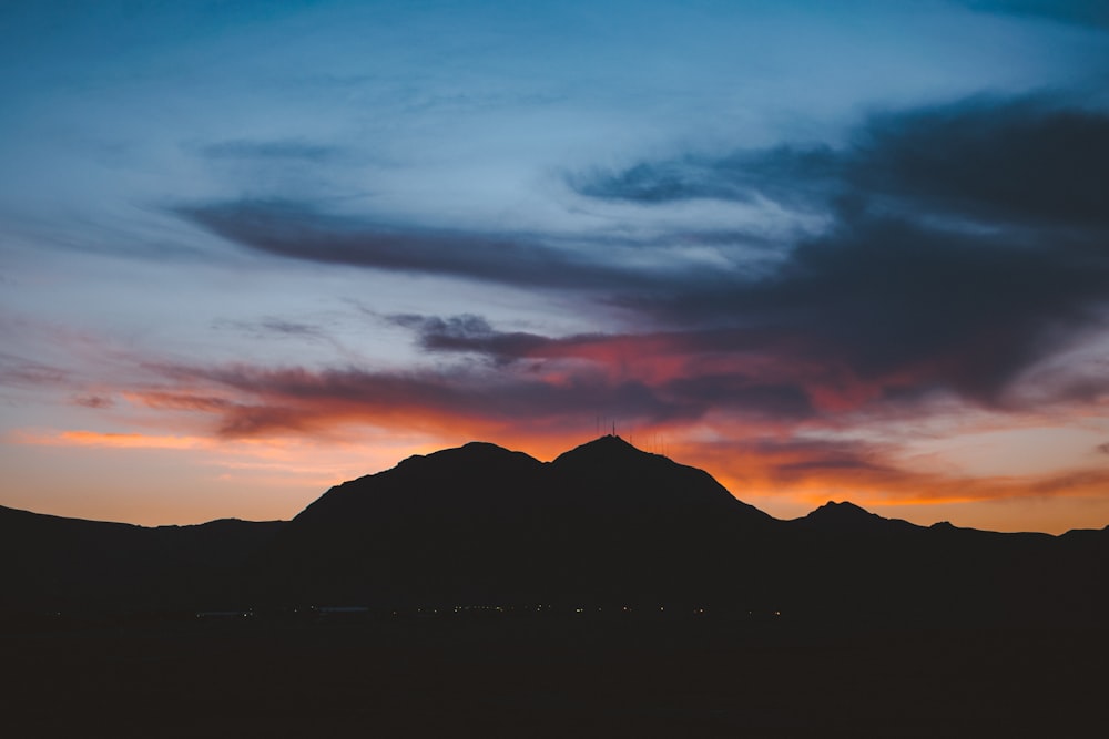 silhouette of mountain during dusk