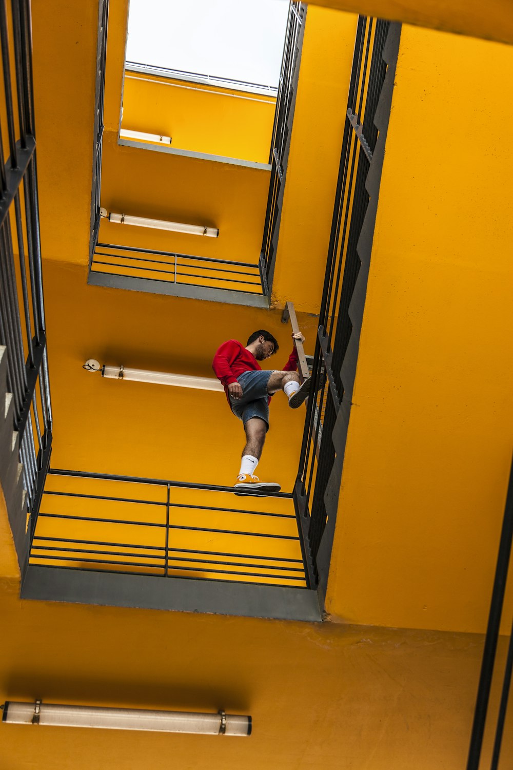 man standing on rails