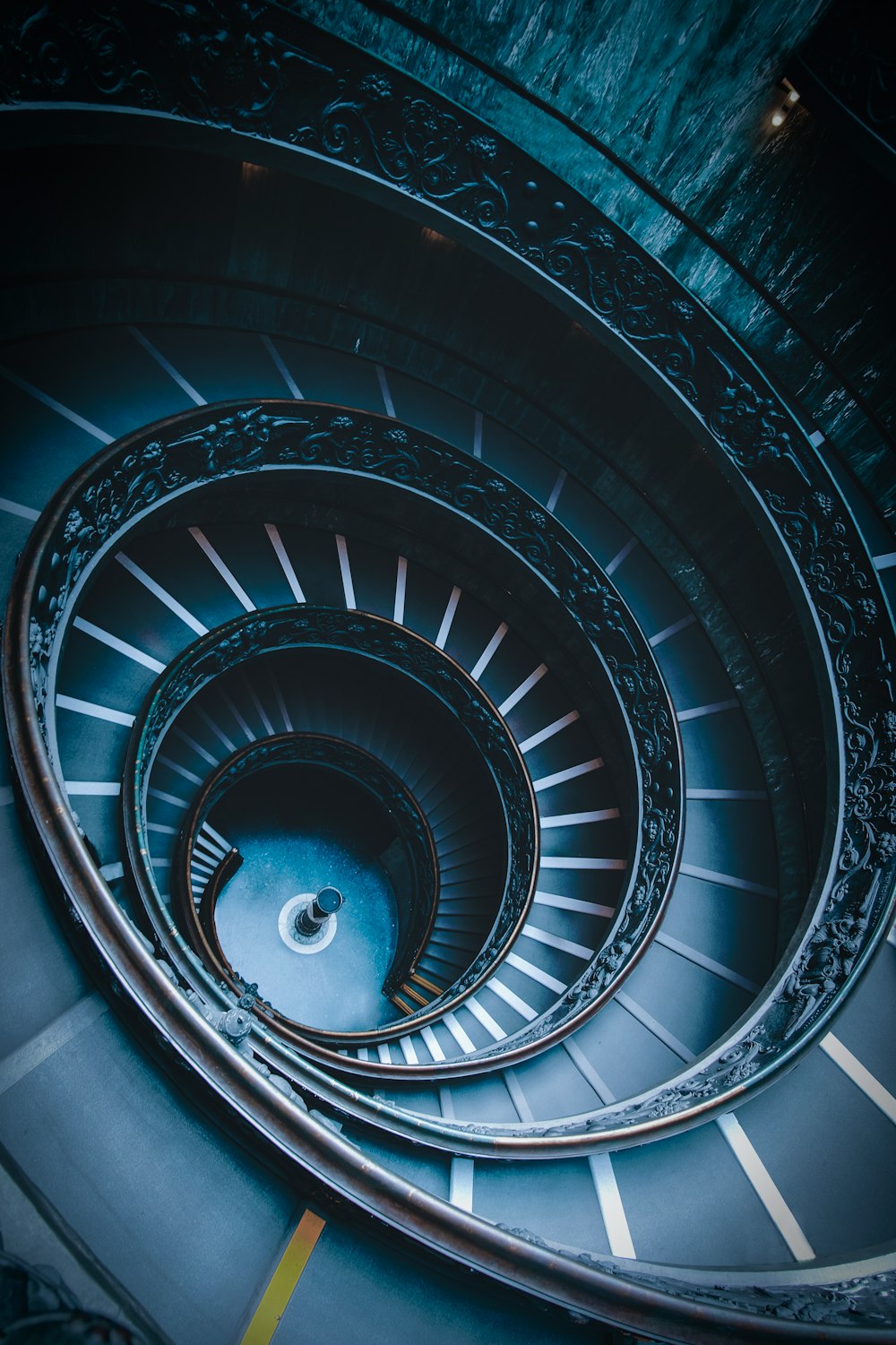 closeup photo of black spiral stairs