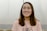 selective focus photograph of woman in pink crew-neck t-shirt