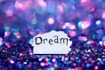 Dream signage surrounded sequins
