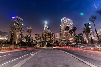 timelapse photo of busy road near buildings