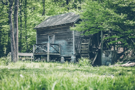 gray wooden shed with watermill in Tennessee United States