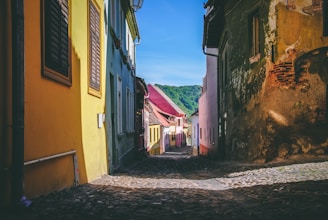 A picturesque view of Haapsalu's historic architecture with colorful buildings lining a cobblestone street.
