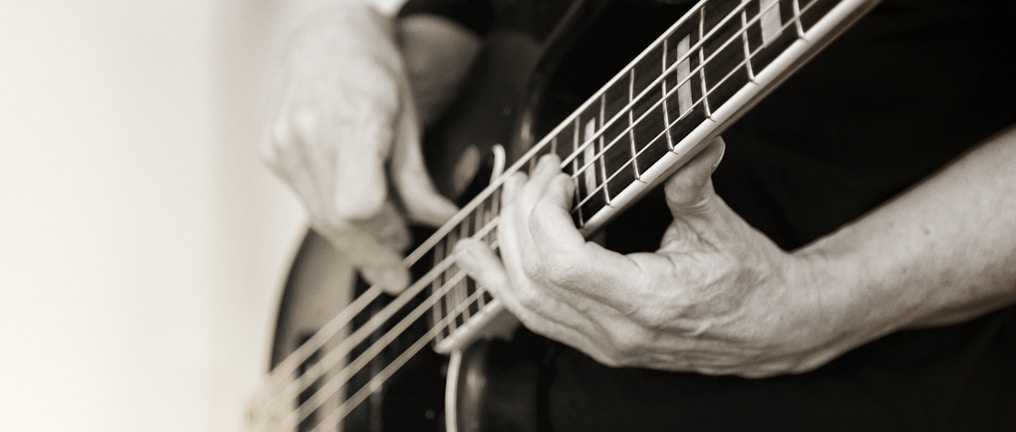 man playing electric guitar