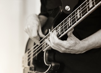 man playing electric guitar