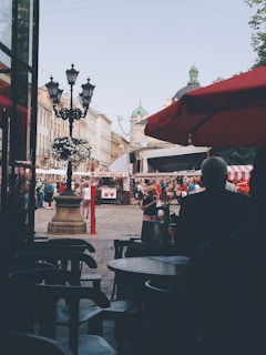 A vibrant street scene in Rome with colorful market stalls and lively locals