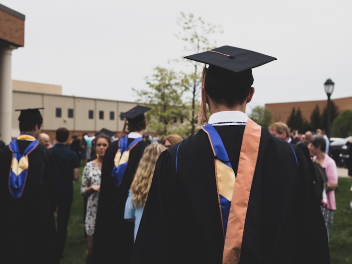 man wearing academic gown