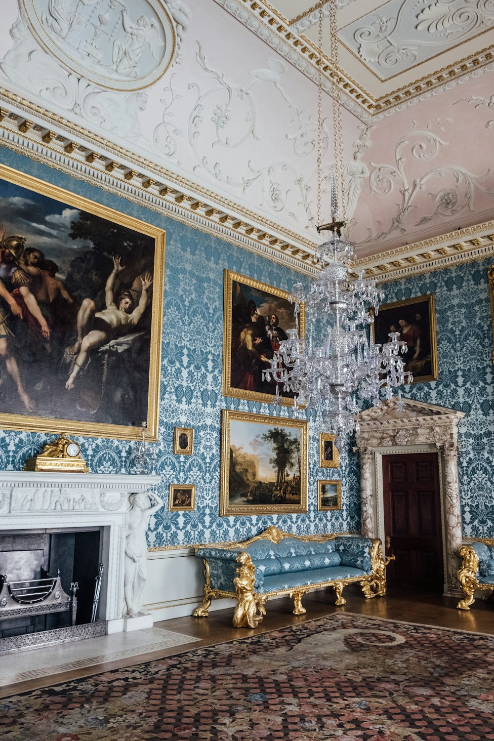 glass chandelier near wall