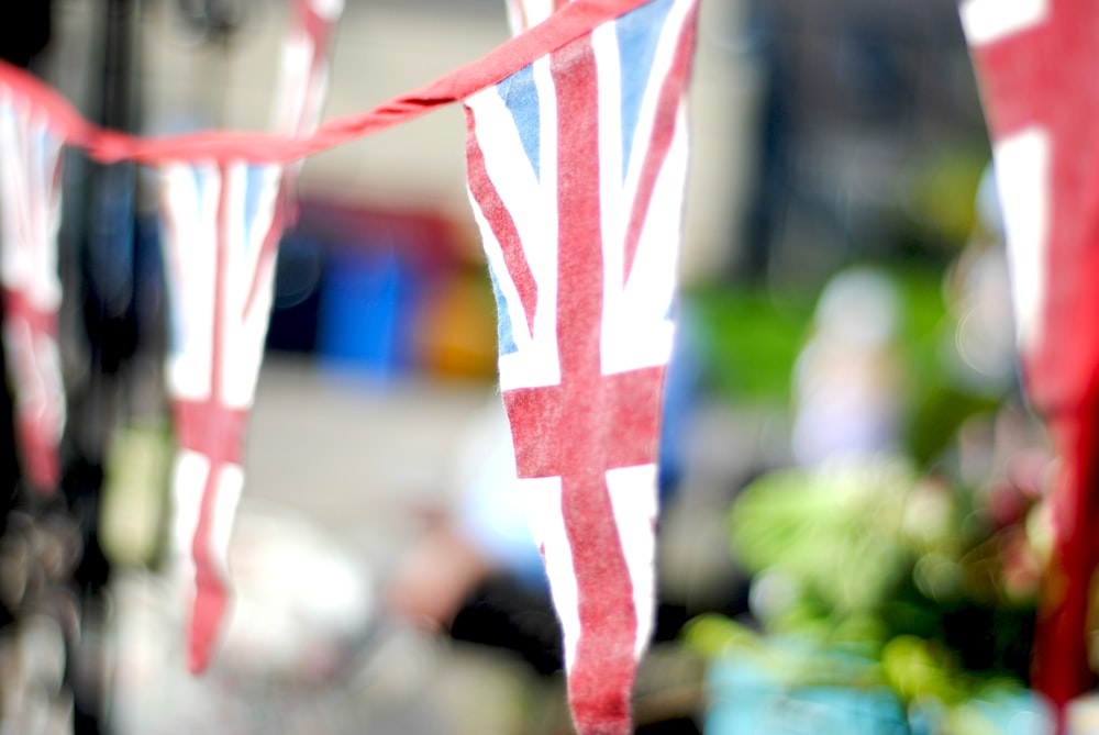 a group of flags hanging from a line